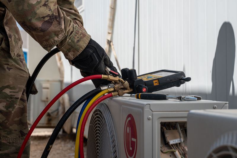 U.S. Air Force Senior Airman German Benmelej, a heating, ventilation, air conditioning and refrigeration specialist assigned to the 332nd Expeditionary Civil Engineering Squadron, 